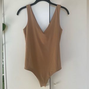Brand new body contour body suit!
